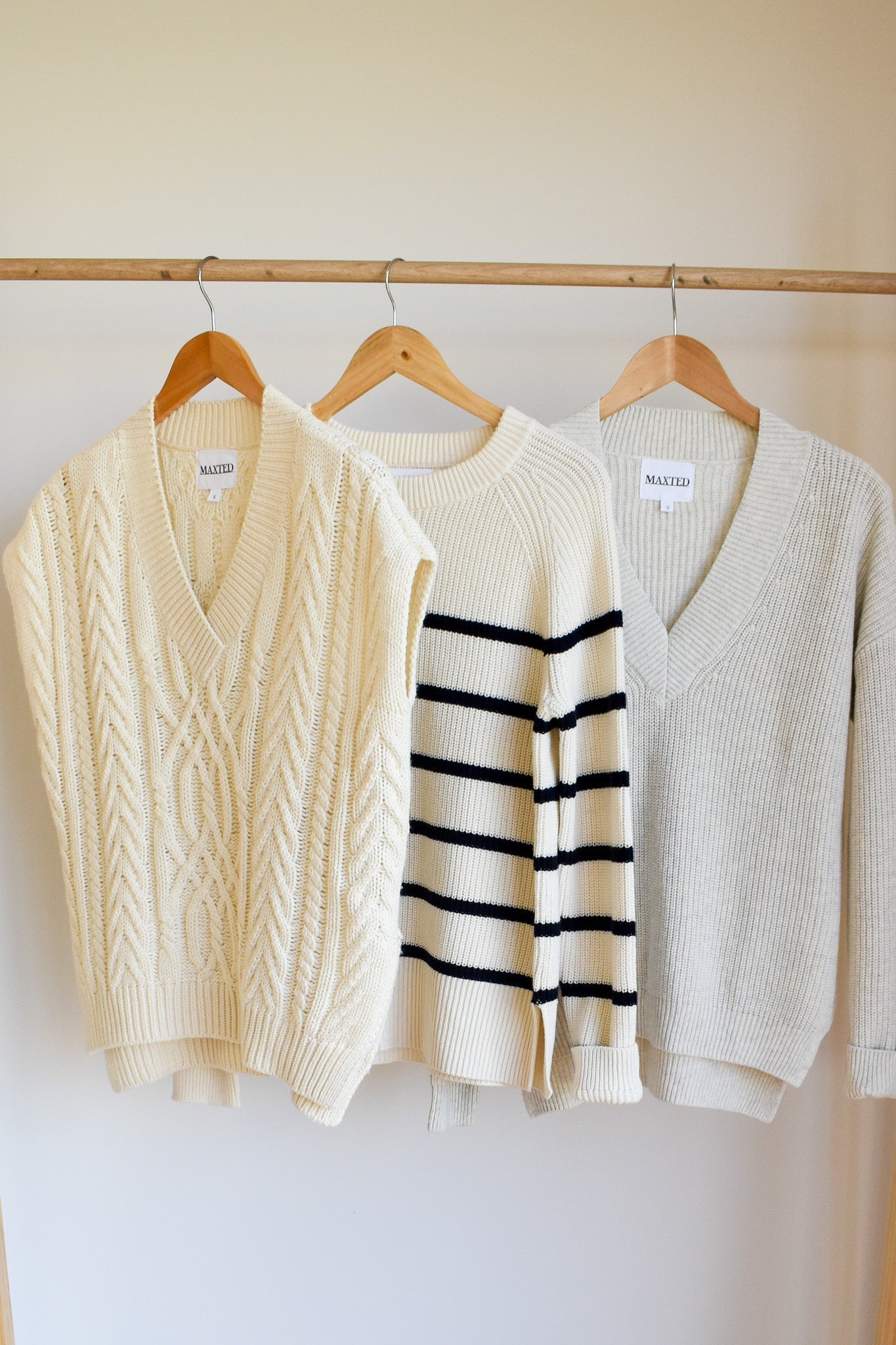 A row of knitted autumn wear