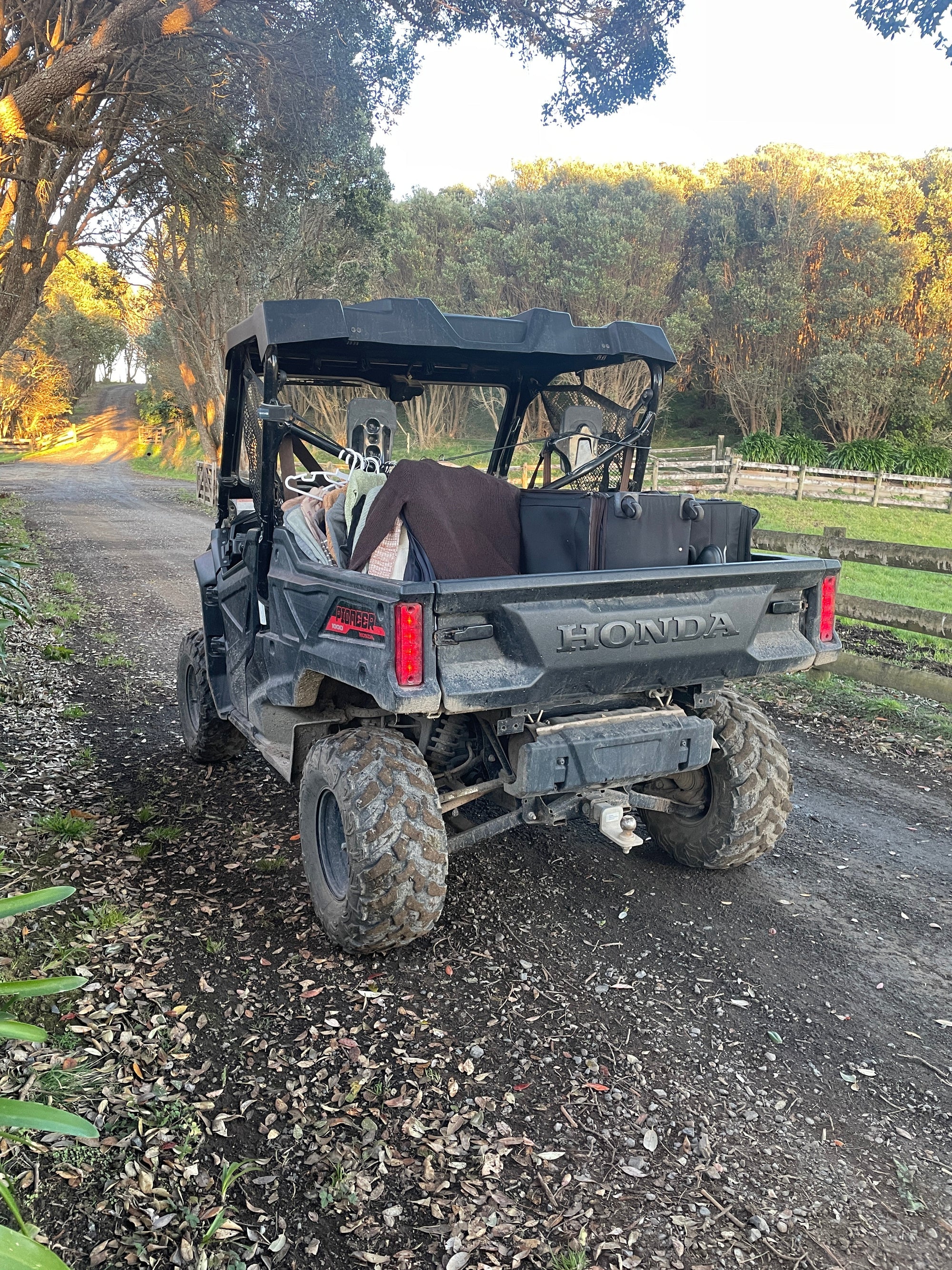 A tractor carrying fashion items for a shoot